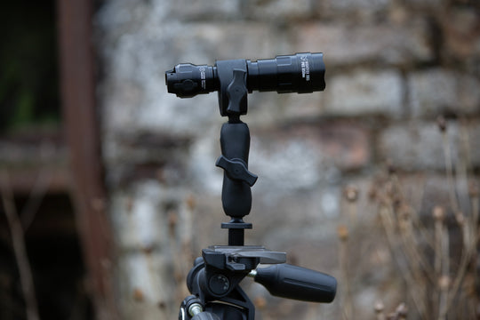 A torch clearly mounted happily on a tripod. This one is infrared.